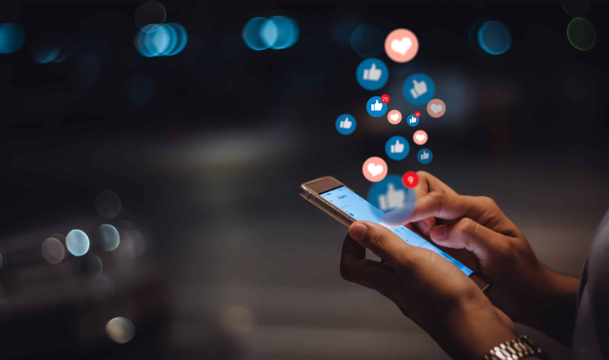 Person engaging with social media posts on a mobile phone